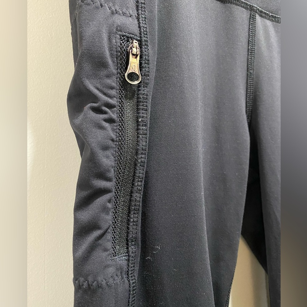 Lululemon crop leggings vertical zipper pocket black sheer size 4